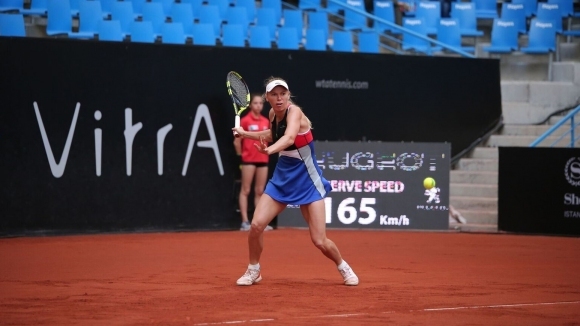 Шампионката от 2014 година Каролин Вожняцки (Дания) отпадна на четвъртфиналите