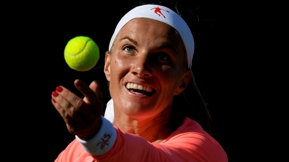 Шампионката от 2004 година Светлана Кузнецова Русия се класира за