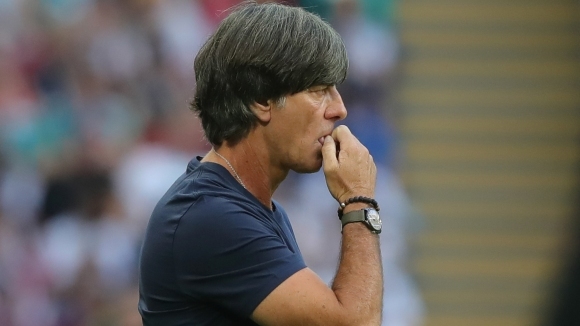 Селекционерът на Германия Йоахим Льов и мениджърът на тима Оливер