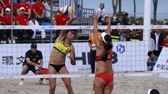 Националните отбори по плажен волейбол на Китай от няколко дни